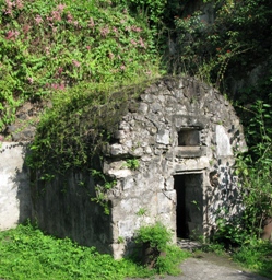 Cyparis’s cell, originally a magazine, used for solitary confinement. Interior view shows the rear aperture, facing the retaining wall.